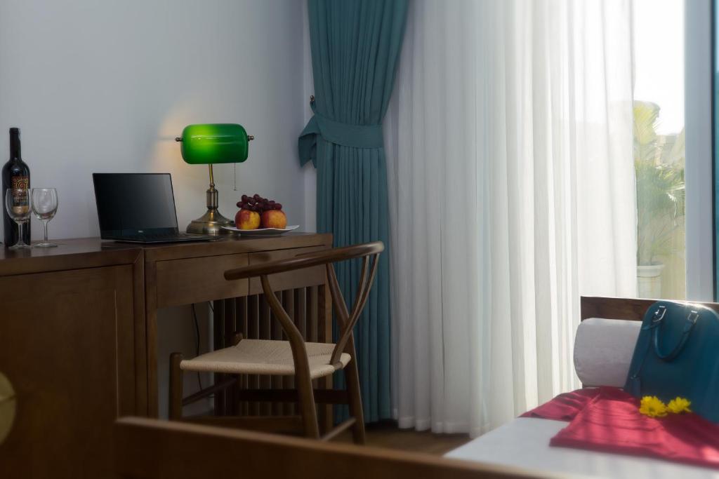 Postel nebo postele na pokoji v ubytování Hanoi Media Hotel & Spa
