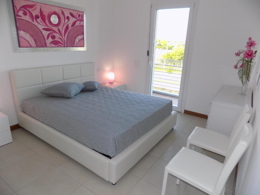 Postel nebo postele na pokoji v ubytování Hotel Residence Sole