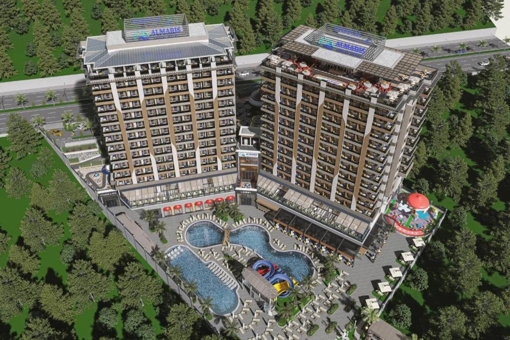 a rendering of two tall buildings and a resort at Almaris Resort in Alanya