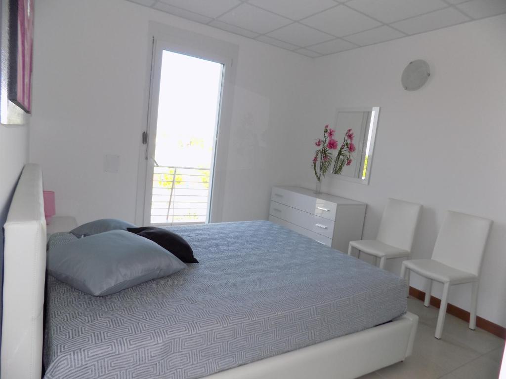 Postel nebo postele na pokoji v ubytování Hotel Residence Sole
