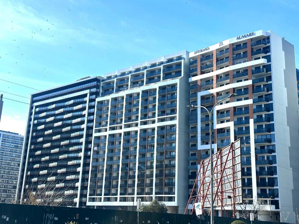 a large office building with a lot of windows at Ande Tower studio in Minda