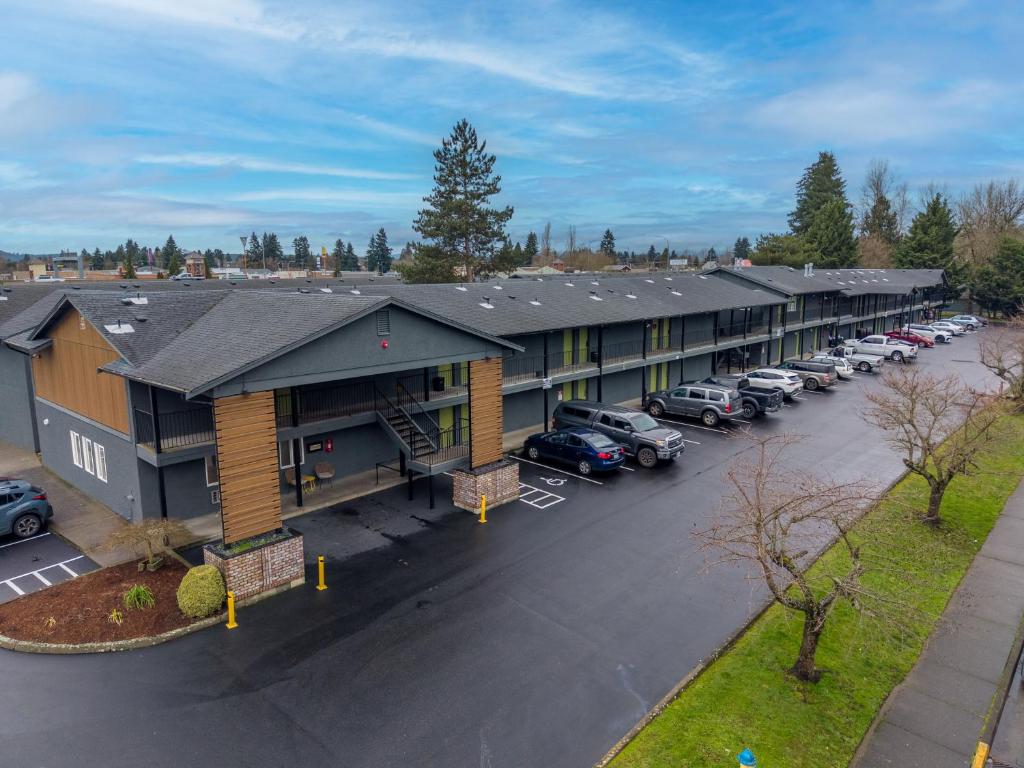 an aerial view of a hotel with a parking lot at Varsity North in Centralia