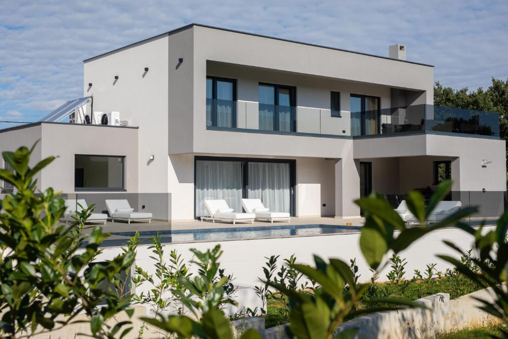 a rendering of a house with a swimming pool at Villa Vox in Labin