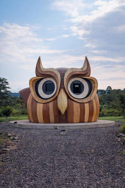 a sculpture of a face of an owl at Animal Glamping in Pomona