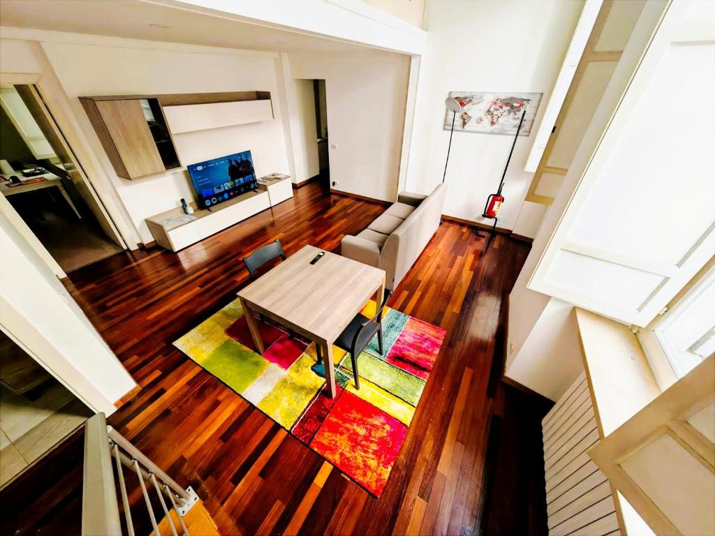 an overhead view of a living room with a table at MS Piazza del Papa Sea Port in Ancona