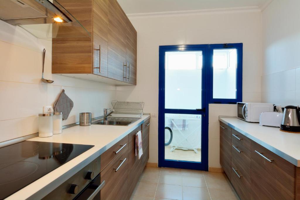 Kuchyň nebo kuchyňský kout v ubytování Villa Pura Vida