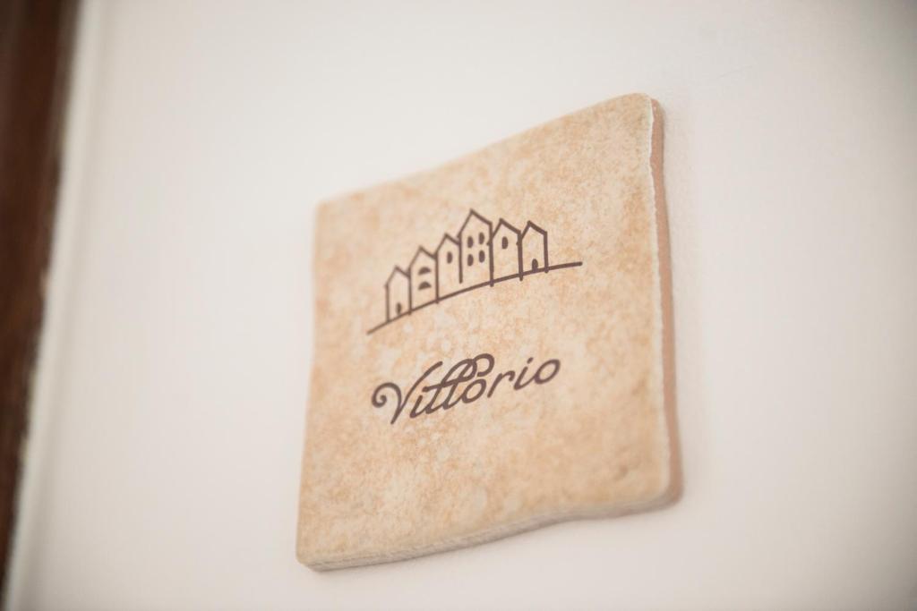 Certifikát, hodnocení, plakát nebo jiný dokument vystavený v ubytování Dimora Cappuccini Guest House