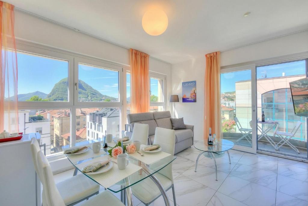 Attico al Parco: Penthouse in Lugano | Balcony, A/C & 2 min from Lake - Happy Rentals