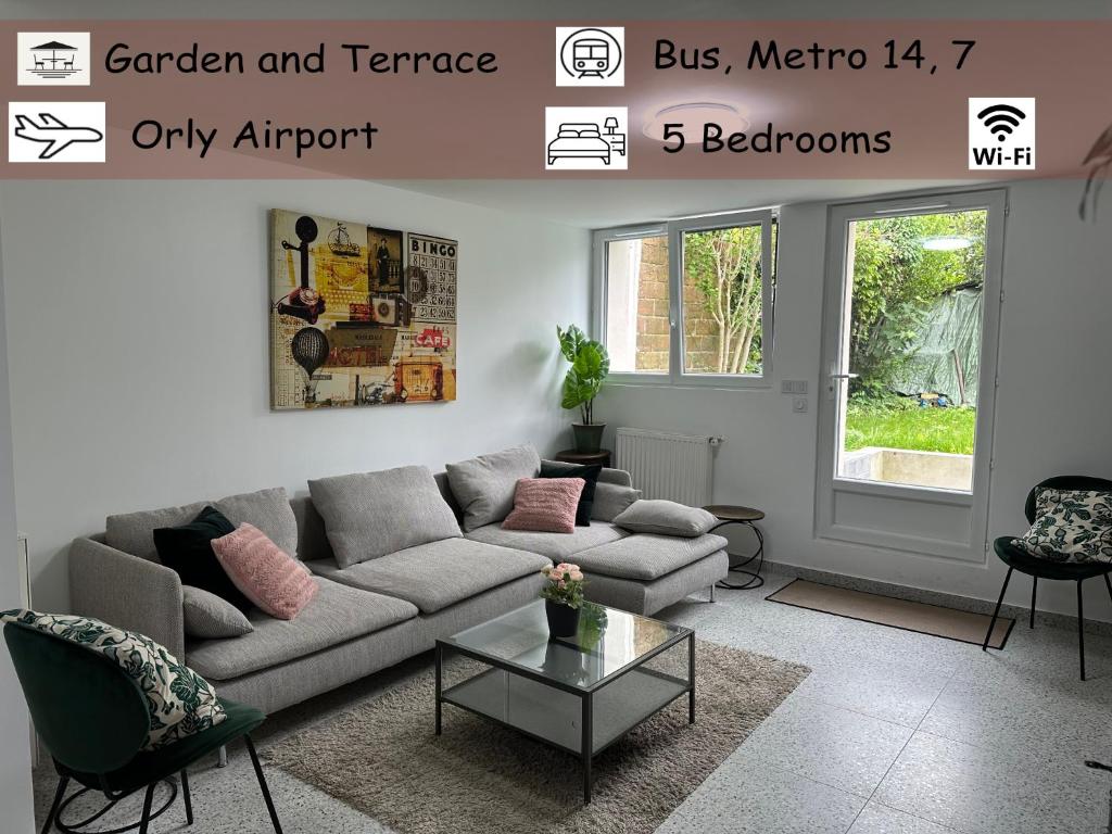 a living room with a couch and a table at Dream House Paris 5 chambres proche M7et M14 in Villejuif