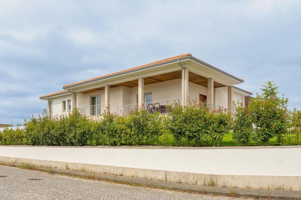 a house on the side of a road at Mirador House in Vila Garcia