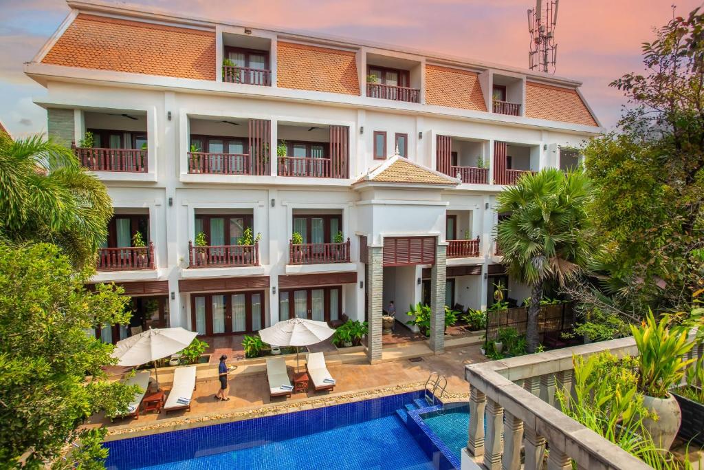 an image of a hotel with a swimming pool at Mera Residence in Siem Reap