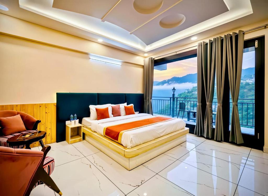 a bedroom with a bed and a balcony at The Pranav Retreat A Premium Property in Nainital