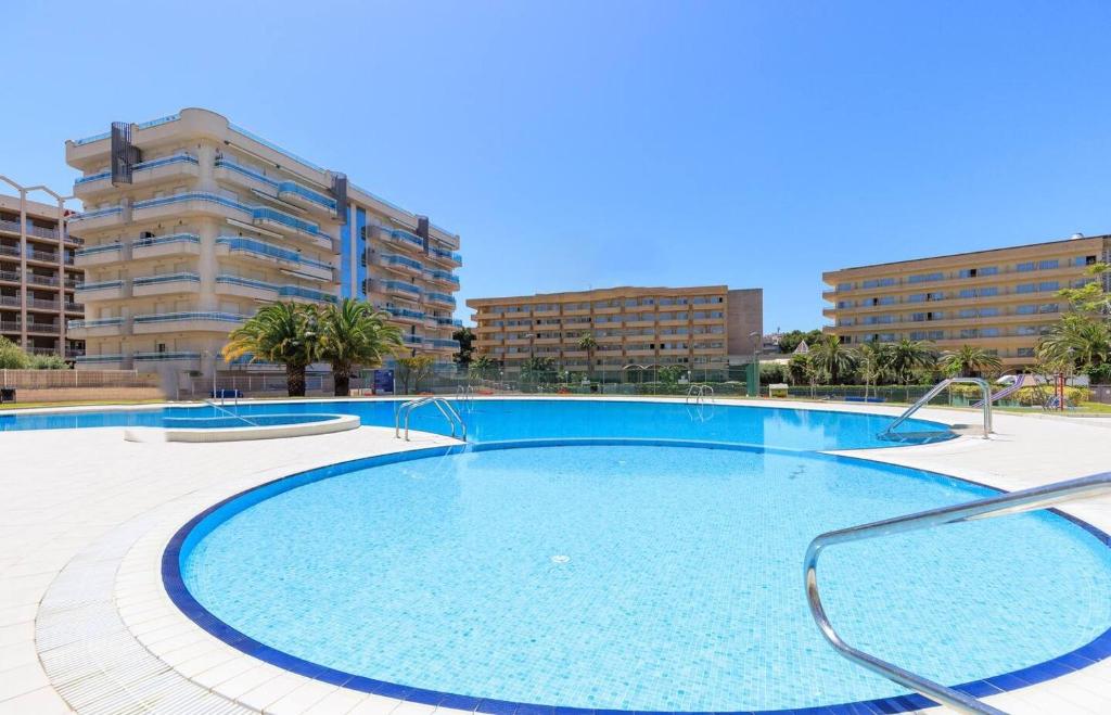 Apartamento tipo Resort, cerca playa, con parking