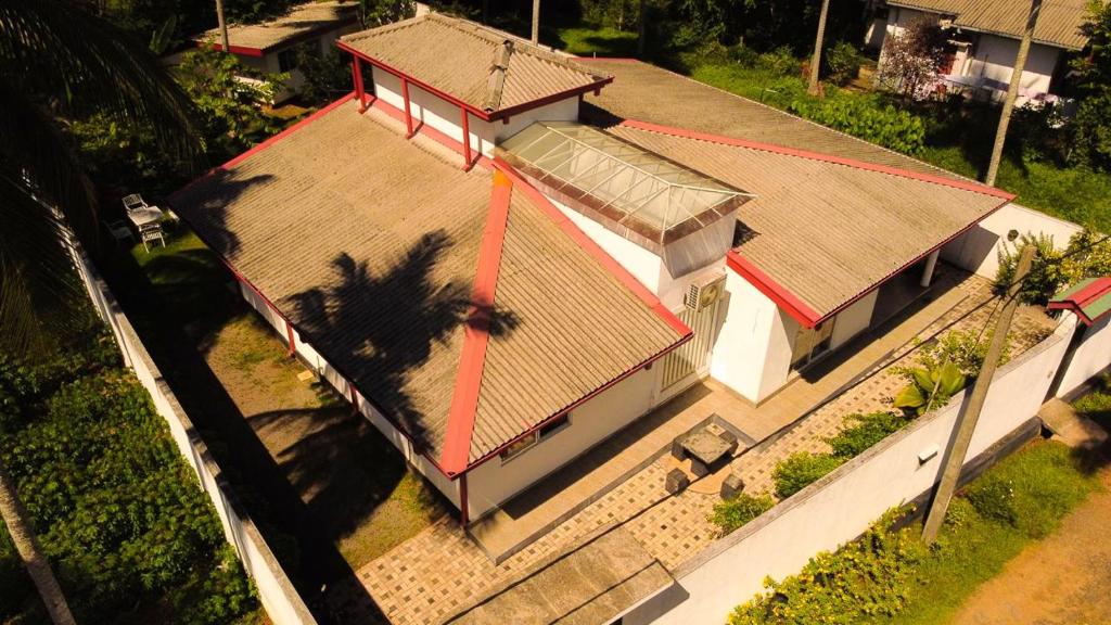an overhead view of a house with red tape on it at White House in Ranala