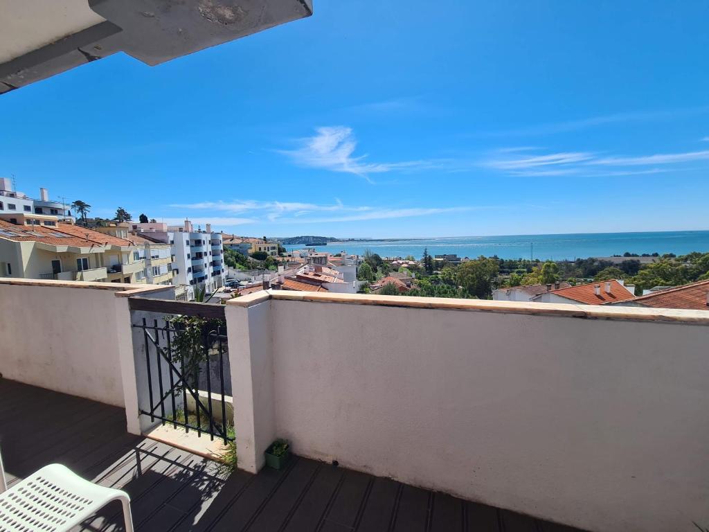 a balcony with a view of the ocean at Bright by the Beach - by CoH in Cruz Quebrada