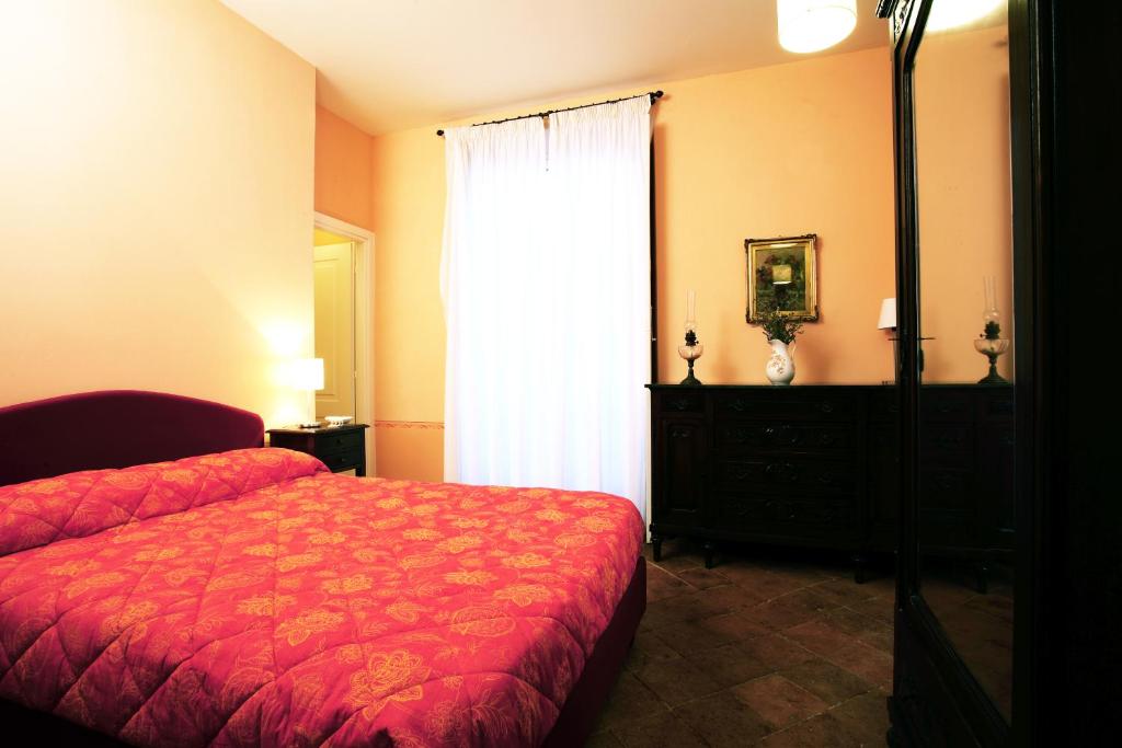 Posteľ alebo postele v izbe v ubytovaní Villa D'Azeglio