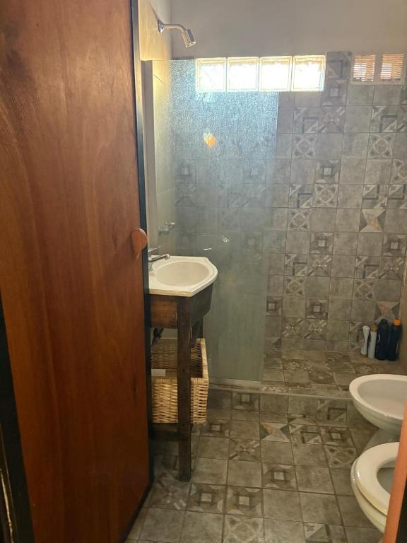 Suma Qamaña - Casa en la montaña al lado del río