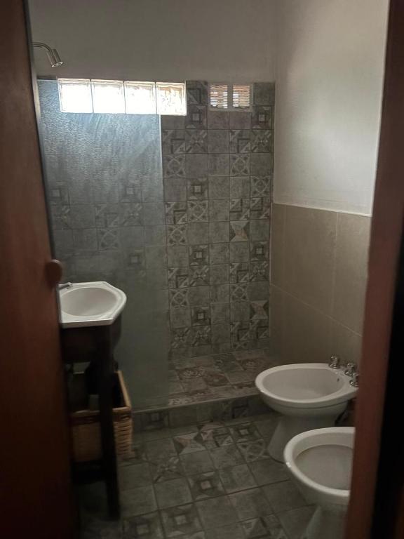 Suma Qamaña - Casa en la montaña al lado del río