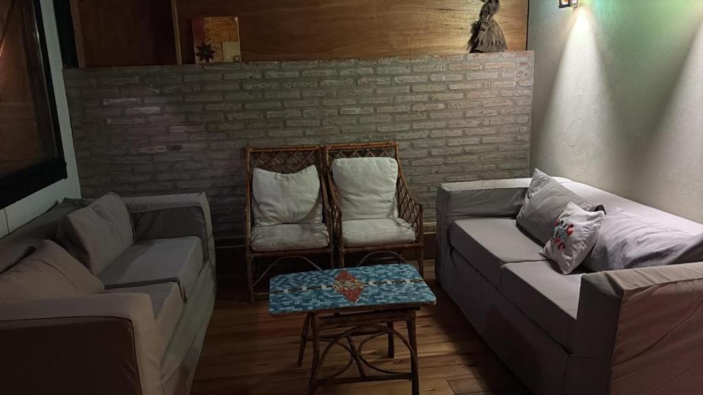 Suma Qamaña - Casa en la montaña al lado del río