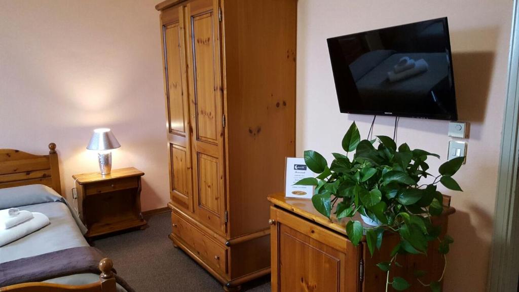 Postel nebo postele na pokoji v ubytování Hotel Calaluna