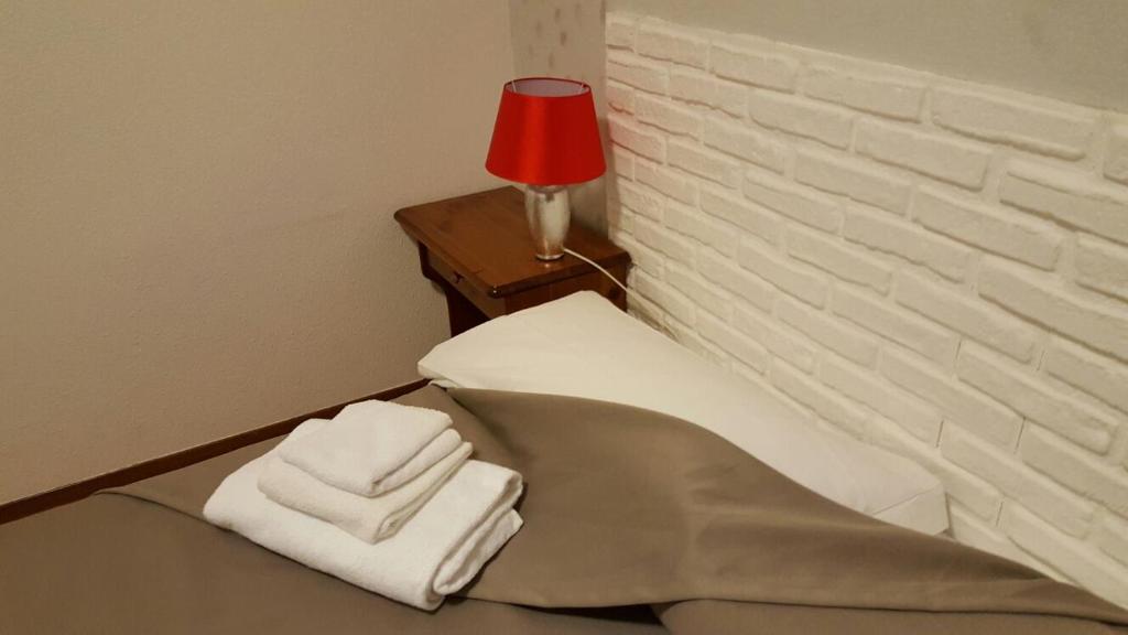 Postel nebo postele na pokoji v ubytování Hotel Calaluna