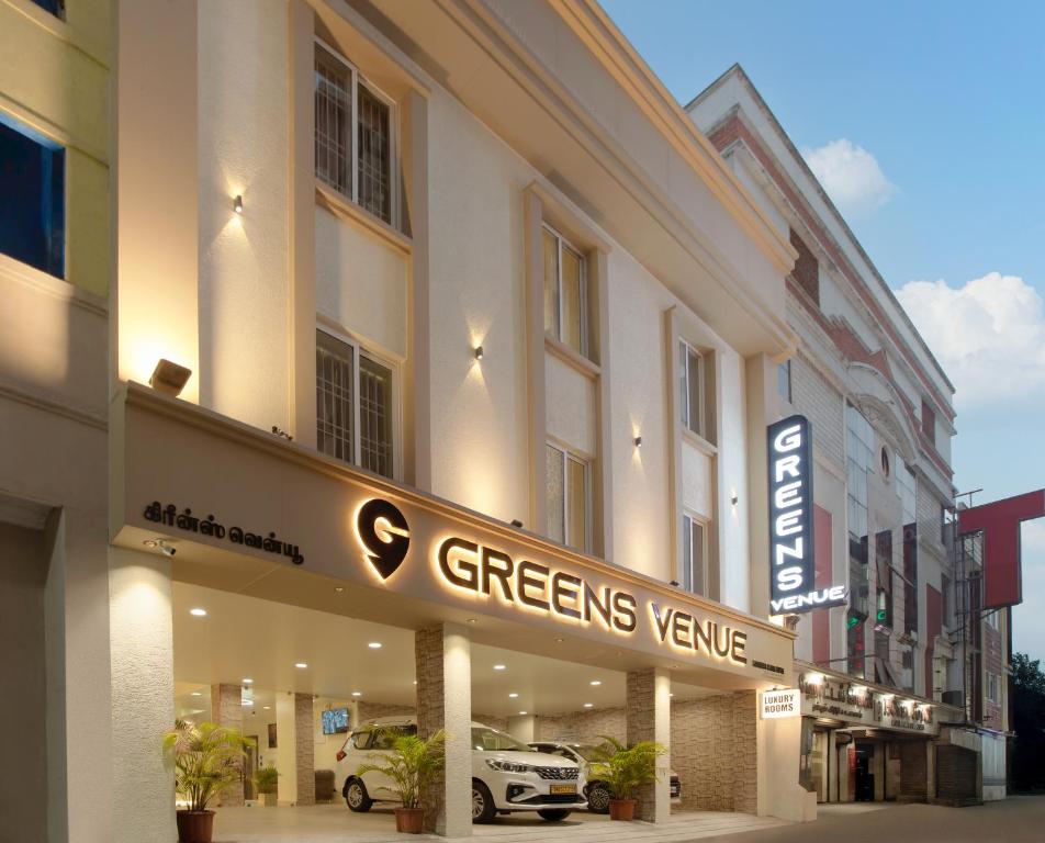 a hotel with a sign that reads greensvenuevenue at Greens Venue in Chennai