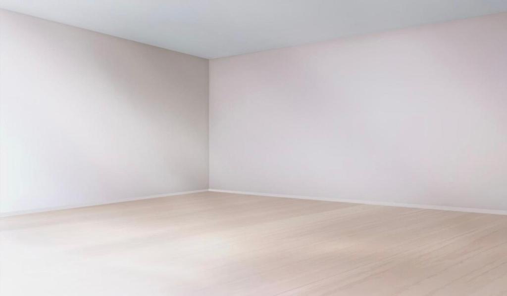 an empty room with white walls and a wooden floor at Pokój dla dwóch osób in Bilten