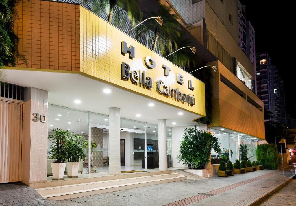 a building with a sign that reads biliary center at Hotel Bella Camboriú in Balneário Camboriú