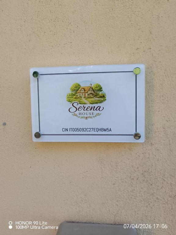 a sign on a wall that says sergio at Serena House in Robella