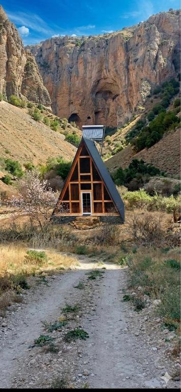 a small cabin in the middle of a mountain at Metsadzor Resort, Areni in Areni