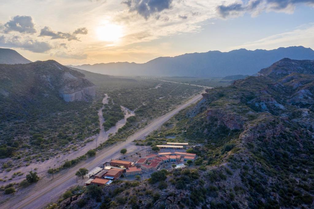 an aerial view of a road in the mountains at El Chiflon Posta Pueblo in El Chiflón