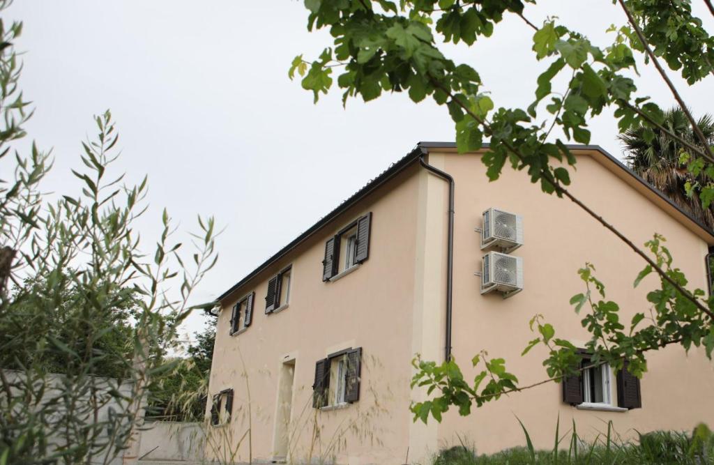 a building with windows on the side of it at Resort Helenia in Caulonia