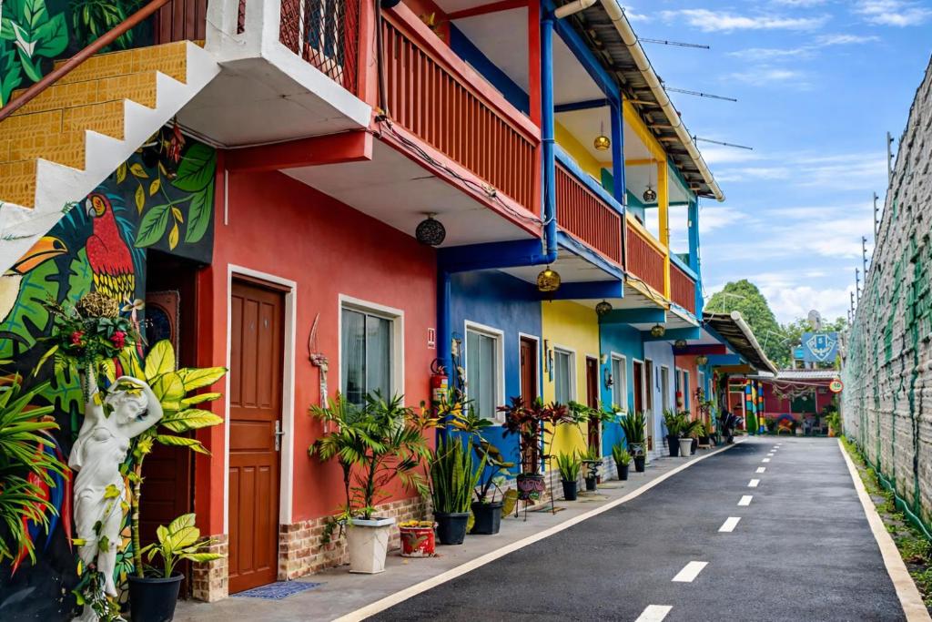 a street in a town with colorful buildings at Pousada Vila Formosa in Belém