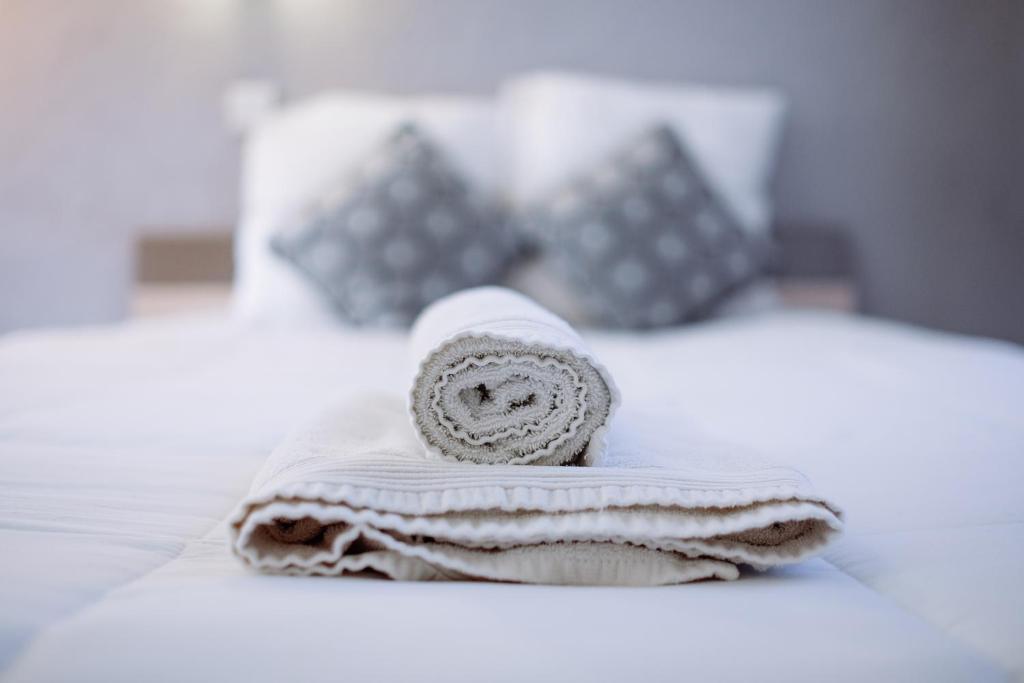 Postel nebo postele na pokoji v ubytování Hôtel Pedussaut
