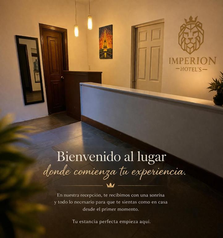 a sign for the immigration lobby of a building at Casa Hotel Imperion in Bogotá
