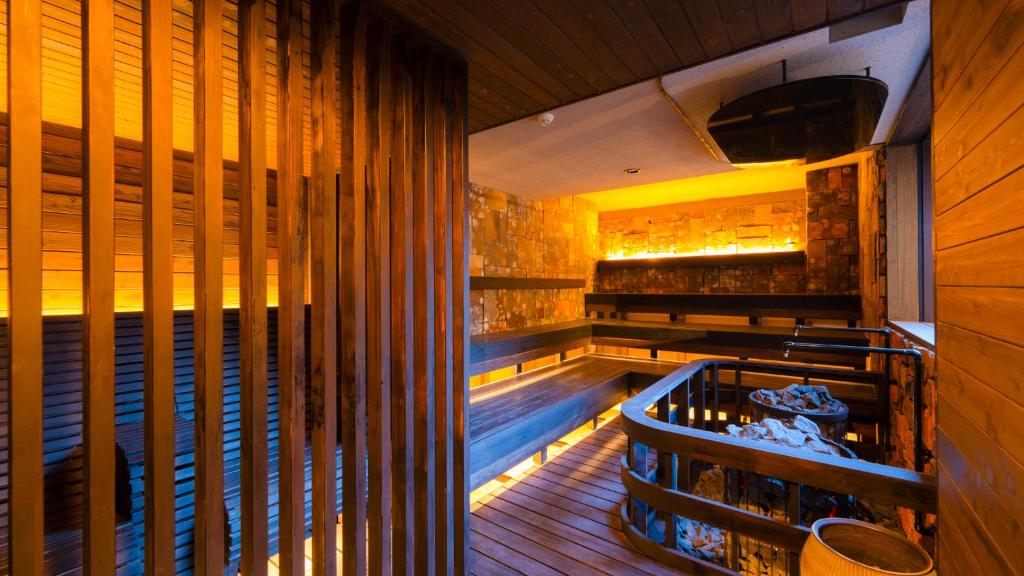 a restaurant with a pool in the middle of a room at OND HOTEL（オンドホテル） in Takeo