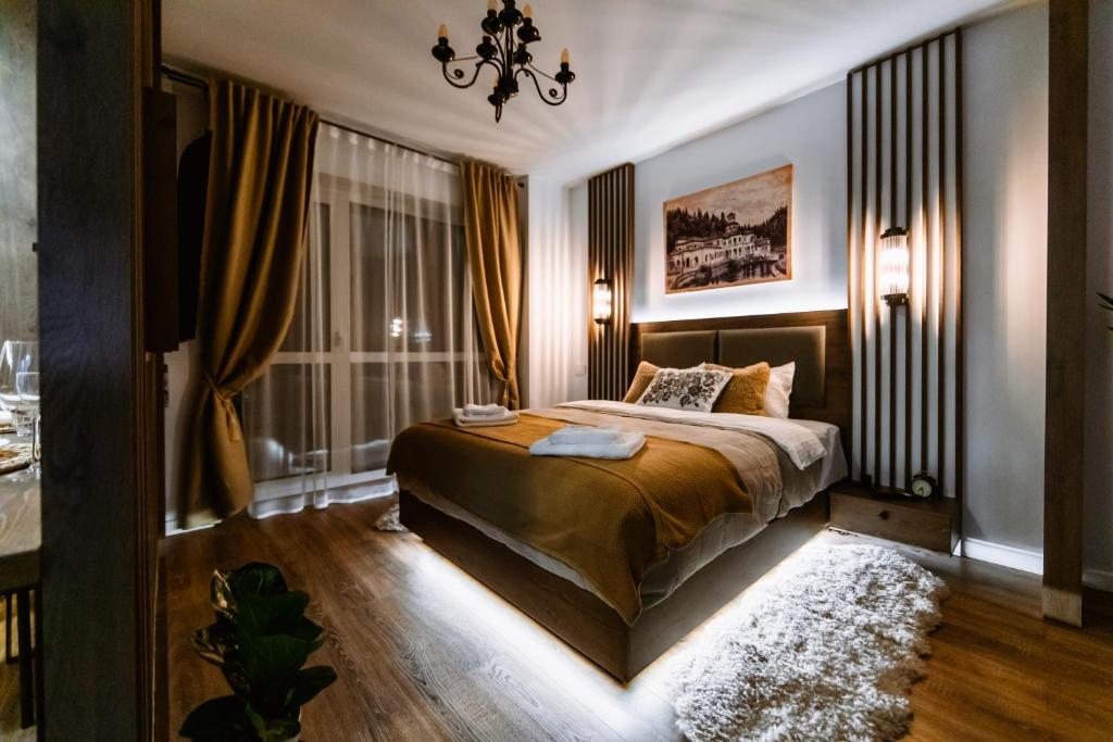 Llit o llits en una habitació de Eliss Studio Sinaia - spa si piscina contra cost