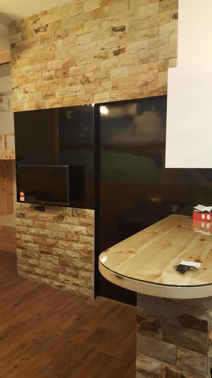 Kuchyň nebo kuchyňský kout v ubytování D'calton seaview apartment