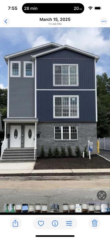 a picture of a house on the side of a street at Blessed Homes in East Orange
