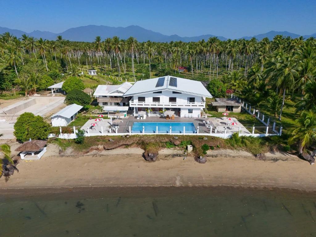 an aerial view of a house on the beach at Chilly Beach Resort Palawan in Aborlan