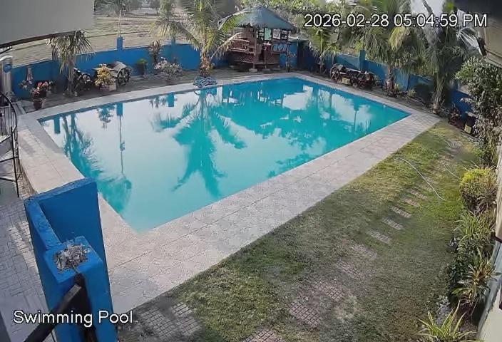 a large swimming pool with blue water at Group stay Pangasinan in Bugallon