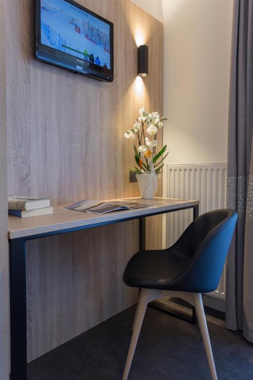 TV a/nebo společenská místnost v ubytování Tourist Hotel