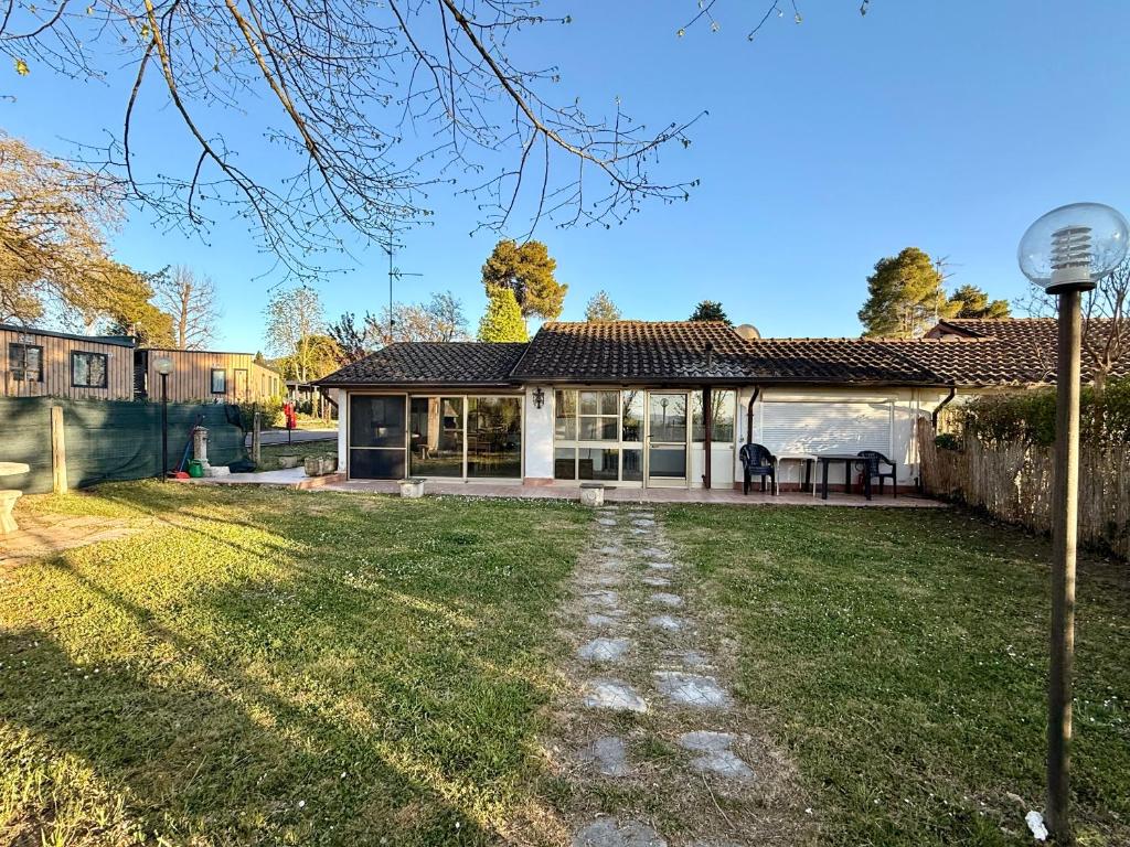 a house with a lawn in front of it at Casa Barbara in Sant Arcangelo