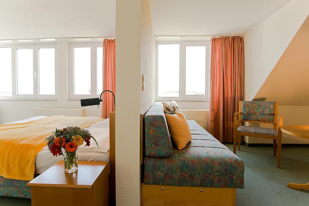 Voodi või voodid majutusasutuse Apart Hotel Gera toas