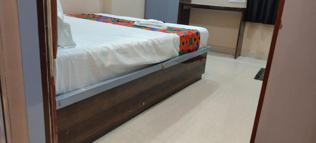 a close up of a bed in a room at Hotel royale in Kolkata
