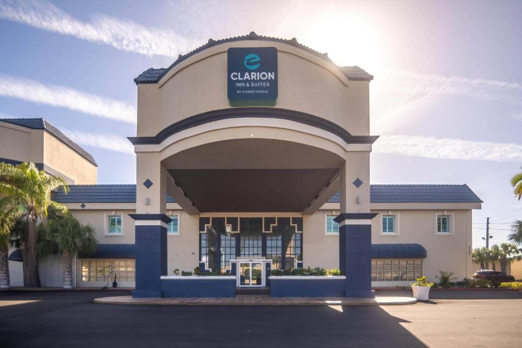 a building with a sign that reads calcium hospital at Clarion Inn & Suites Central Clearwater Beach in Clearwater