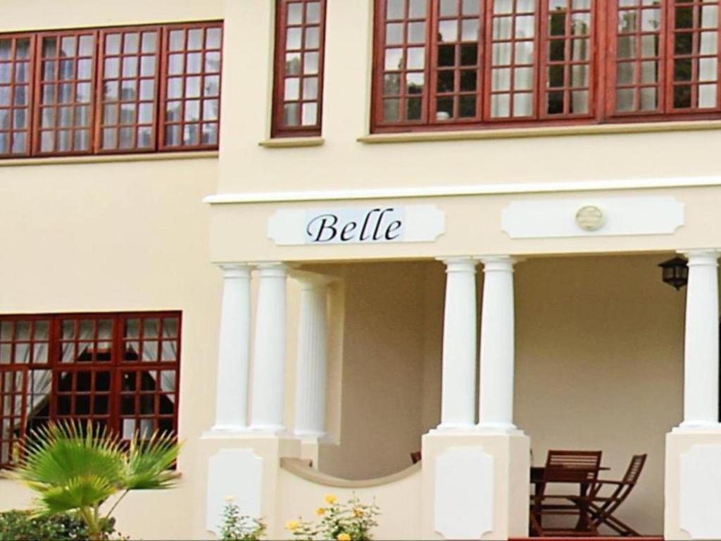 a building with a sign that reads bella at Belle Vue in Queenstown
