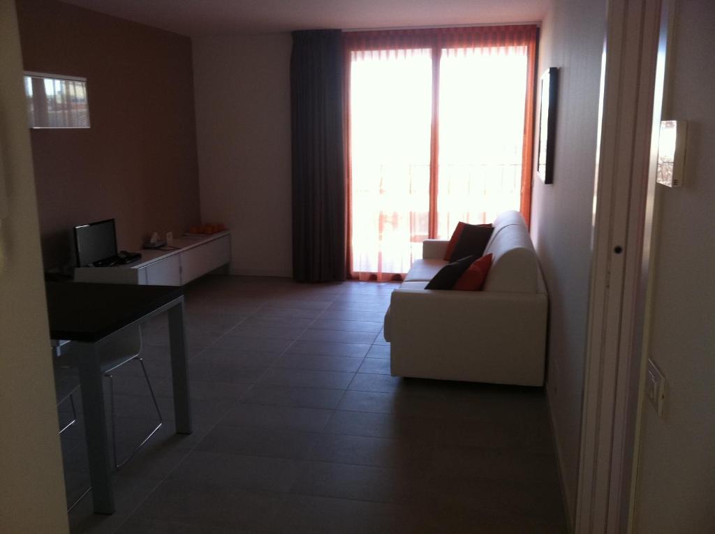 Kuchyň nebo kuchyňský kout v ubytování Residence Ormeggio