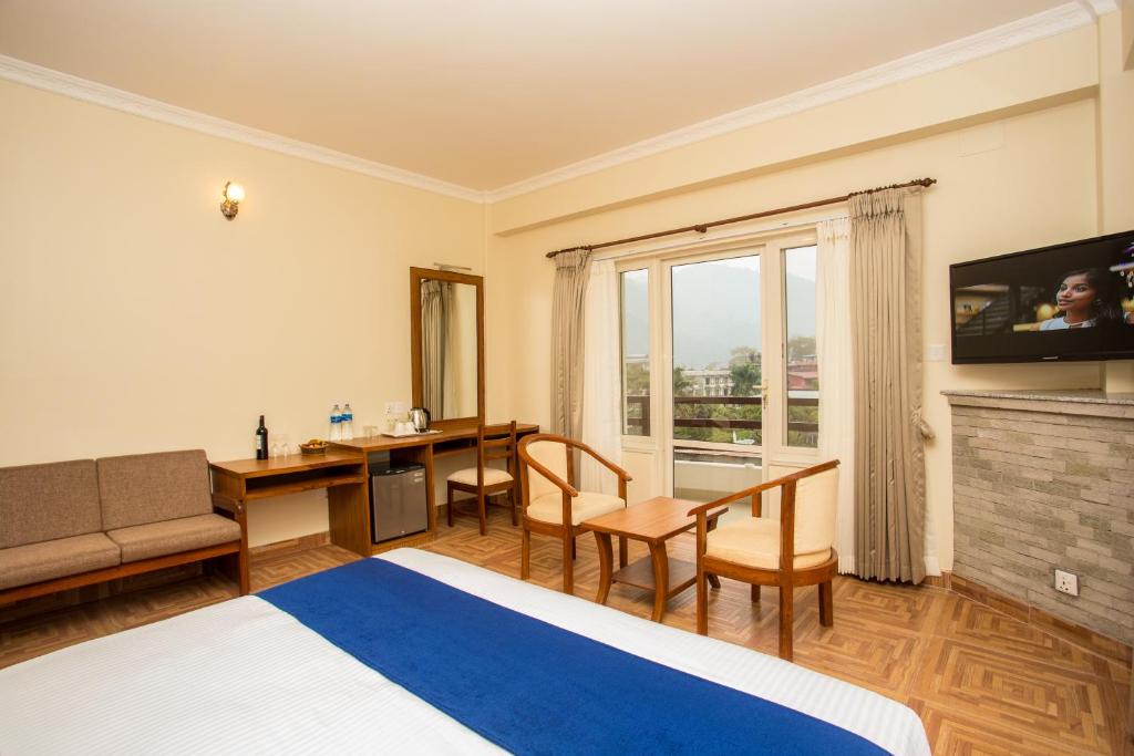 Sjónvarps- og/eða afþreyingartæki á Hotel White Pearl