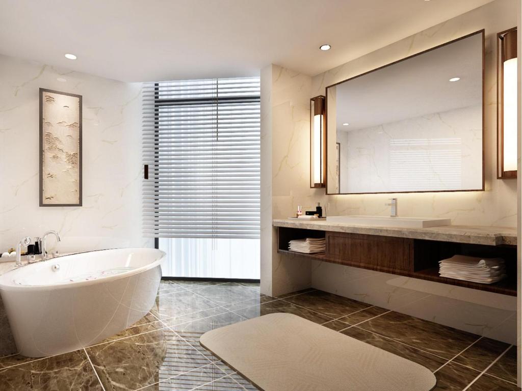 Koupelna v ubytování Grand Skylight International Hotel Huizhou